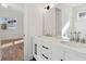 Bathroom featuring a double sink vanity and neutral color palette at 260 Miller Reed Se Ave, Atlanta, GA 30315