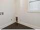 Modern laundry room with dark herringbone tile flooring at 260 Miller Reed Se Ave, Atlanta, GA 30315