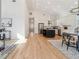 Open-concept living space featuring hardwood floors, modern finishes, and an eat-in kitchen at 260 Miller Reed Se Ave, Atlanta, GA 30315