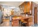 Bright kitchen with stainless steel appliances, granite countertops, wood cabinets and eat-in kitchen island at 105 Parkside Cir, Decatur, GA 30030