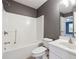 A bathroom featuring a shower-tub combo and a single sink vanity at 224 Berkley Dr, Villa Rica, GA 30180