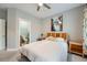 Comfortable bedroom with ensuite bathroom, a ceiling fan, and wall art at 625 Aunt Lucy Sw Ln # 34/19, Smyrna, GA 30082