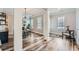 Dining room with modern chandelier, stylish decor, and wood-look flooring at 625 Aunt Lucy Sw Ln # 34/19, Smyrna, GA 30082