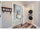 Hallway view into bedroom and laundry with stacked washer and dryer at 625 Aunt Lucy Sw Ln # 34/19, Smyrna, GA 30082