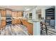 Updated kitchen with granite countertops, stainless steel appliances, wood cabinets, and bar stool seating at 625 Aunt Lucy Sw Ln # 34/19, Smyrna, GA 30082