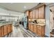 Kitchen and open living space featuring granite counters, stainless appliances, and hardwood floors at 625 Aunt Lucy Sw Ln # 34/19, Smyrna, GA 30082