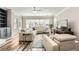 Inviting living room with a fireplace, built-in shelving, and comfortable seating arrangement at 625 Aunt Lucy Sw Ln # 34/19, Smyrna, GA 30082