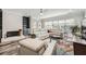 Cozy living room with a fireplace, built-in shelving, and comfortable seating at 625 Aunt Lucy Sw Ln # 34/19, Smyrna, GA 30082