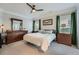 Spacious main bedroom featuring neutral walls, carpet floors, and ensuite bathroom at 625 Aunt Lucy Sw Ln # 34/19, Smyrna, GA 30082