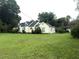 Quaint single-story home with a neatly kept lawn and classic design elements at 2535 Glenwood Se Ave, Atlanta, GA 30317