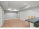 Spacious basement with recessed lighting, a bar, and tile flooring, perfect for entertaining or relaxing at 520 Waterside Ct, Canton, GA 30114
