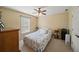 Cozy bedroom with a ceiling fan, closet, and good light at 520 Waterside Ct, Canton, GA 30114