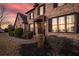 Handsome brick home with a stately entrance, detailed shutters, and professional landscaping at 520 Waterside Ct, Canton, GA 30114