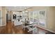 Eat-in kitchen showcases granite countertops, modern stainless appliances, and bright natural light at 520 Waterside Ct, Canton, GA 30114