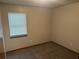 Simple bedroom with carpet flooring, natural lighting, and a serene ambiance at 1281 Bugle Ct, Hampton, GA 30228