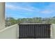 Building balcony with view of green tree line against a blue sky at 300 Johnson Ferry Ne Rd # B411, Atlanta, GA 30328