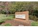Brick community sign for Mount Vernon Towers Condominiums, set amidst mature landscaping and colorful flower beds at 300 Johnson Ferry Ne Rd # B411, Atlanta, GA 30328