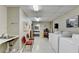 Community laundry room featuring multiple machines and a utility sink at 300 Johnson Ferry Ne Rd # B411, Atlanta, GA 30328