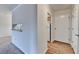 Open-concept living room with a pass-through to the kitchen and neutral carpeting at 300 Johnson Ferry Ne Rd # B411, Atlanta, GA 30328