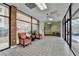 Bright lobby area with tile flooring, seating, and large windows at 300 Johnson Ferry Ne Rd # B411, Atlanta, GA 30328