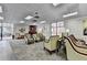 Spacious lobby area with carpet, seating, and large windows at 300 Johnson Ferry Ne Rd # B411, Atlanta, GA 30328