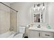 Updated bathroom with a tub/shower combination and modern vanity lighting at 100 Brickworks Ne Cir # 104, Atlanta, GA 30307