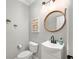 Charming powder room with modern fixtures and stylish decorative accents at 100 Brickworks Ne Cir # 104, Atlanta, GA 30307