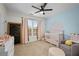 Bright Bedroom with a crib, soft colors, and decorative accents at 100 Brickworks Ne Cir # 104, Atlanta, GA 30307