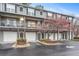 Charming condo building featuring a well-maintained facade, private balconies and convenient garage parking at 100 Brickworks Ne Cir # 104, Atlanta, GA 30307