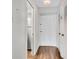 Entryway featuring a coat closet and an open view to the kitchen and condo's living space at 2870 Pharr Court South Nw # 2002, Atlanta, GA 30305