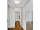 Hallway that features wood-look tile flooring that leads to the bathroom and other rooms of the house at 2870 Pharr Court South Nw # 2002, Atlanta, GA 30305