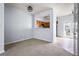 Cozy living room with gray carpet and a passthrough into the kitchen at 3610 Ginnis Rd # 4, Atlanta, GA 30331