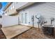 Outdoor patio with weathered concrete slab and view of back exterior at 3610 Ginnis Rd # 4, Atlanta, GA 30331