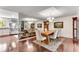 Traditional dining room features hardwood floors, a rustic table and chairs, with elegant chandelier at 4867 Township Trce, Marietta, GA 30066