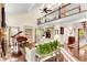 Bright living room with a piano, high ceilings, balcony, and hardwood floors at 4867 Township Trce, Marietta, GA 30066