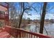 Relaxing view of lake from deck showing a multi-level deck overlooking the water at 730 Reeves Lake Sw Dr, Marietta, GA 30064