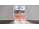 Sliding glass patio doors leading to an outdoor deck with lake views at 730 Reeves Lake Sw Dr, Marietta, GA 30064