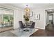 Dining area with backyard view, chandelier and modern decor at 3263 Dodson Dr, Atlanta, GA 30344