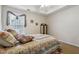 Bedroom with a decorative quilt bed and a ceiling fan at 7295 Hickory Bluff Dr, Cumming, GA 30040