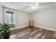 Cozy finished basement bedroom with wood-look flooring and plenty of natural light at 7295 Hickory Bluff Dr, Cumming, GA 30040