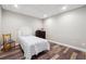 Simple bedroom with stylish wood floors, featuring neutral tones and minimalistic décor at 7295 Hickory Bluff Dr, Cumming, GA 30040