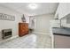 Finished basement kitchen with tiled floors and a window for natural light at 7295 Hickory Bluff Dr, Cumming, GA 30040