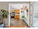 View of the kitchen from the living area, with appliances, natural light, and eat-in area at 7295 Hickory Bluff Dr, Cumming, GA 30040