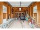 Organized storage area with shelving, garage door, and windows for natural light at 7295 Hickory Bluff Dr, Cumming, GA 30040