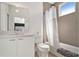 Neutral bathroom with a vanity, toilet, tub and shower combo at 1145 Kirkwood Se Ave # 4, Atlanta, GA 30316