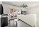 Second-story living room featuring a wet bar, and sliding glass doors to the patio at 1145 Kirkwood Se Ave # 4, Atlanta, GA 30316