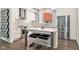 Well-lit kitchen featuring stainless steel appliances, an island with seating, and geometric tile backsplash at 1145 Kirkwood Se Ave # 4, Atlanta, GA 30316