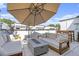 Relaxing rooftop patio with comfortable outdoor seating, fire pit, and dining table, perfect for entertaining guests at 1145 Kirkwood Se Ave # 4, Atlanta, GA 30316