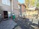 Back patio and outdoor space with pavers and furniture, perfect for relaxation and outdoor entertainment at 1554 Circlestone Dr, Stone Mountain, GA 30088