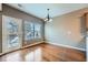 Bright dining room with a door to the deck has hardwood floors and natural light at 3603 Kasner Nw Ct, Kennesaw, GA 30144